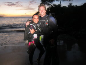 Night Dive sunset couple with Tiny Bubbles at Makena Landing
